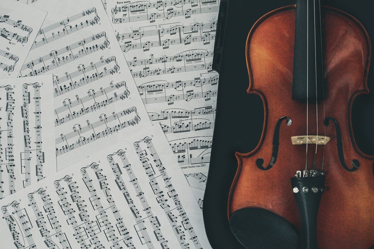 Violin and music pages.